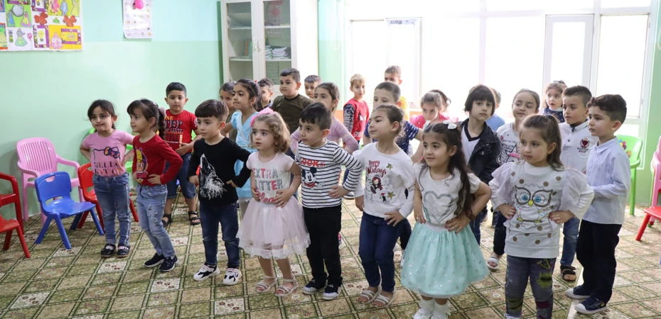 Children at the Christian kindergarten in Bartella. csi