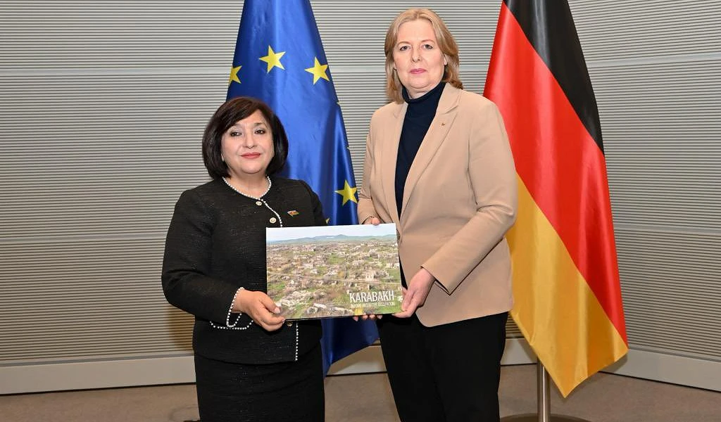 Sahiba Gafarova, speaker of the Azerbaijani parliament, poses with a photo of Karabakh with Bärbel Bas, President of the German Bundestag, just two months after Azerbaijan attacked and ethnically cleansed Nagorno Karabakh.